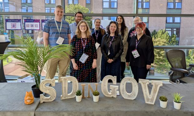 a group photo of conference participants